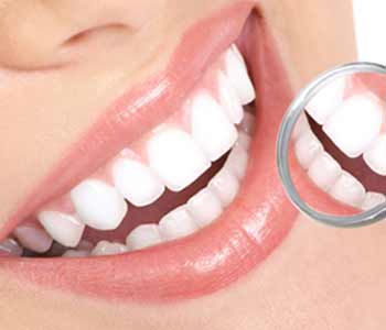 Professional-Grade Teeth Whitening from Dr. John L. Aurelia