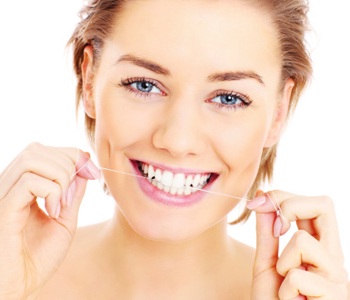 Dentist explains the dental implants procedure
